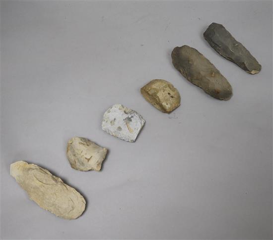 Six prehistoric flint axe heads, various,